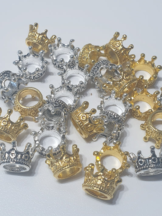Silver or Gold mini crowns. Very pretty.  Fit on Pen.