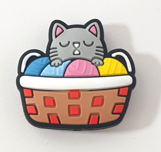 Cat in basket with wool. Focal Silicone. Can fit on pen.