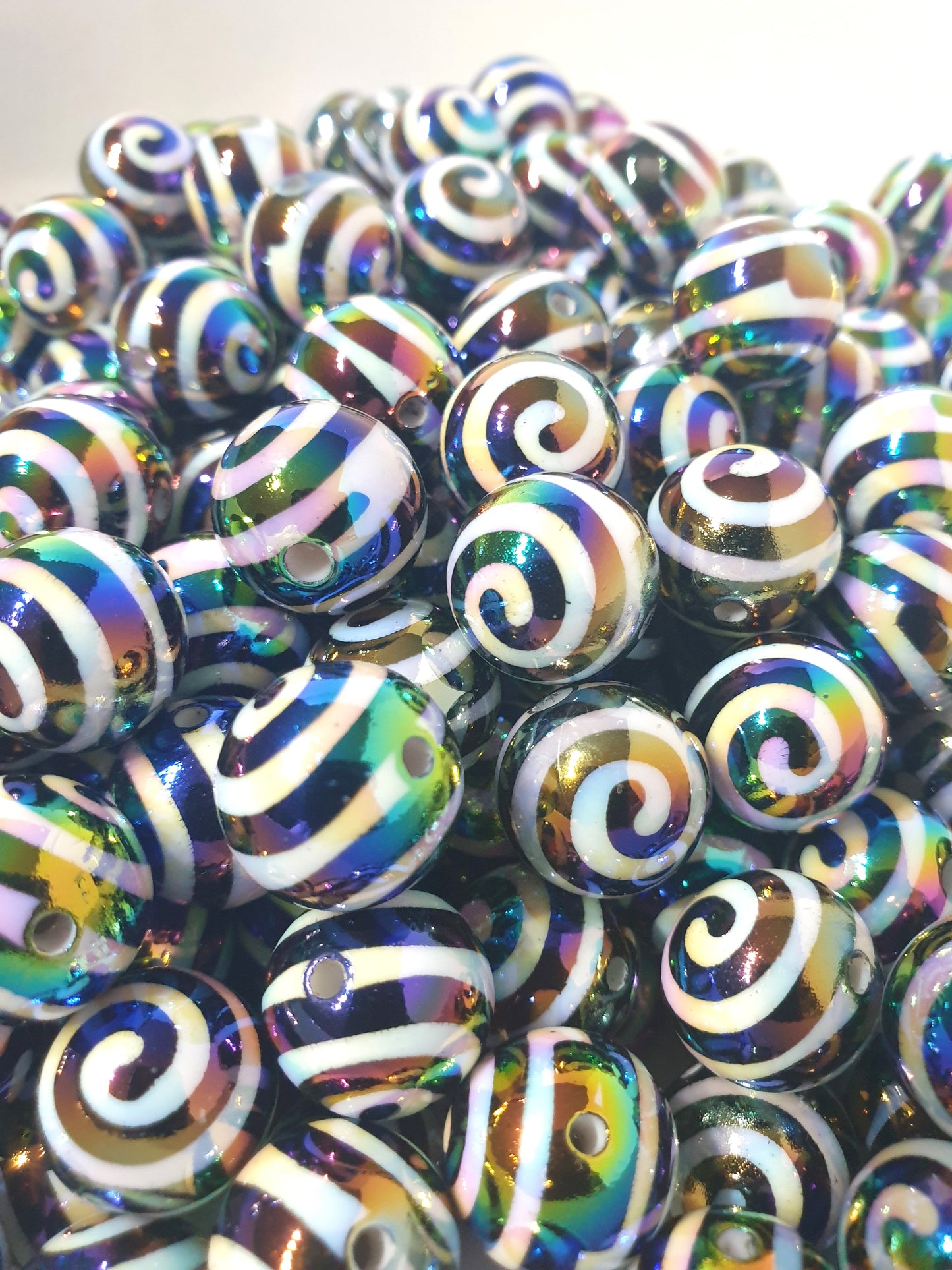 Round 16mm Black and White Swirl beads with UV rainbow finish. Ideal for jewellery and beadable blanks.