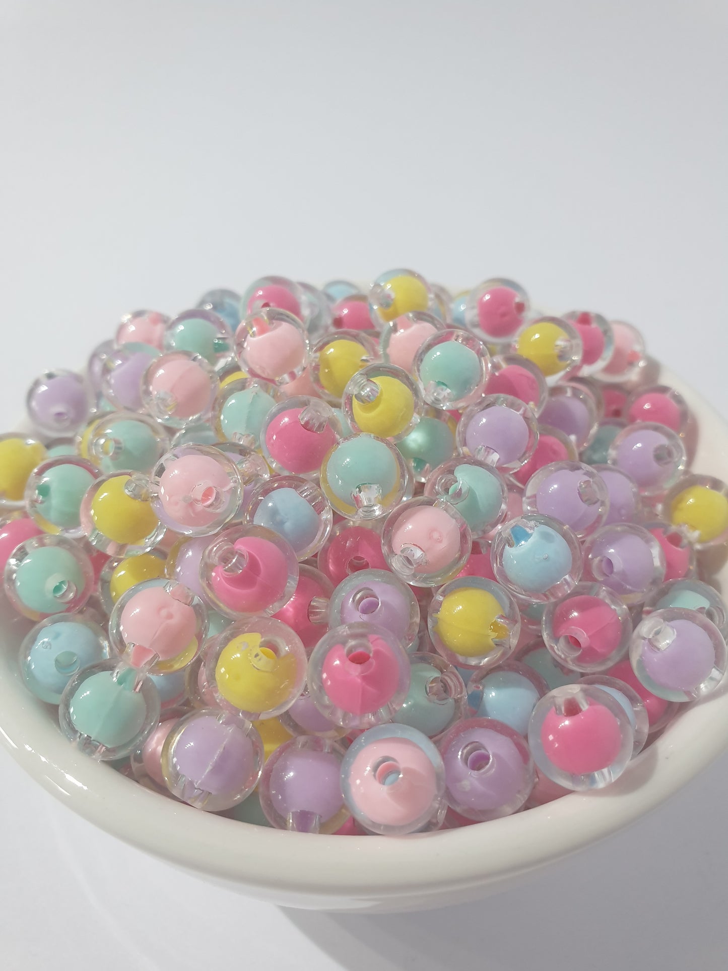 10mm Clear Double Layer. Many colour beads. High quality. Perfect for bracelets and jewellery.