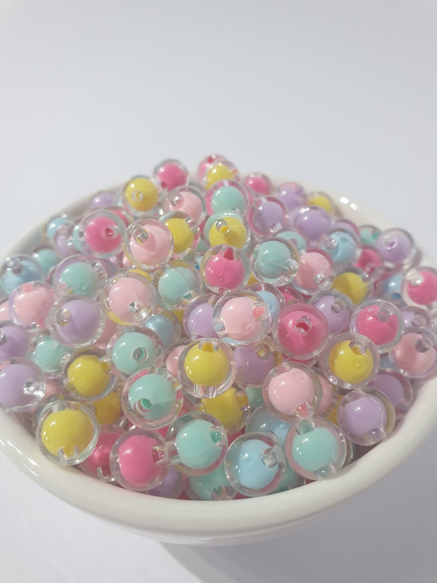 10mm Clear Double Layer. Many colour beads. High quality. Perfect for bracelets and jewellery.