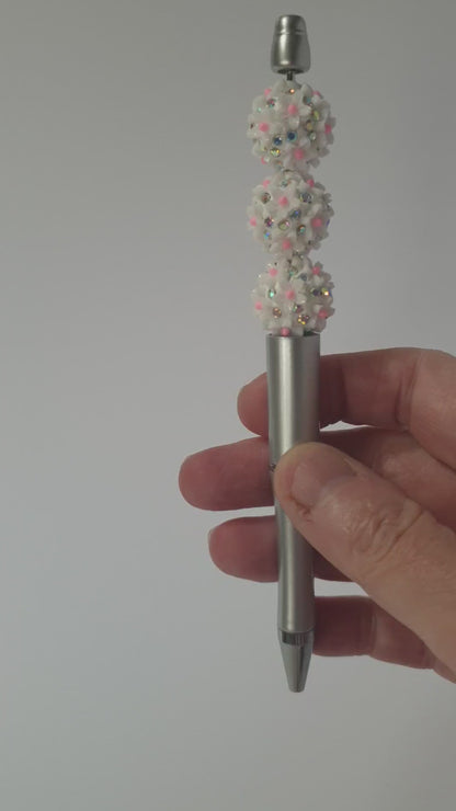 Fancy White with pink and sparkle 19mm.  High quality.